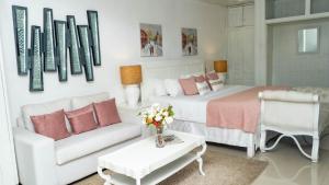 Voodi või voodid majutusasutuse Guacamayos Hotel toas