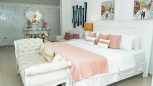 Voodi või voodid majutusasutuse Guacamayos Hotel toas