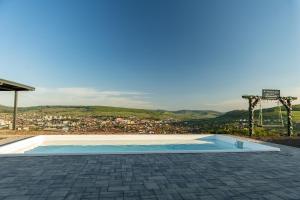 Bazén v ubytování Panorama Residence nebo v jeho okolí