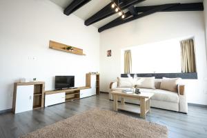 TV a/nebo společenská místnost v ubytování Panorama Residence