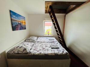 Postel nebo postele na pokoji v ubytování Apartmány 68