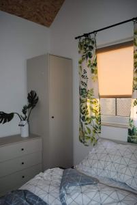 Voodi või voodid majutusasutuse Domki nad morzem, Laba Rusinowo koło Jarosławca, toas