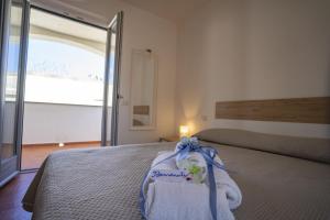 Postel nebo postele na pokoji v ubytování Casa Mimi