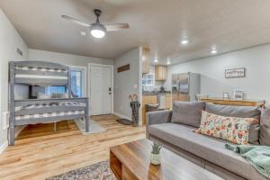 a living room with a couch and a bunk bed at Mt Air Unit 4 · At the base of Mt Hood, family suite 4 in Mount Hood Village