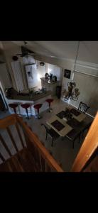 a living room with a table and chairs and a kitchen at Beautiful Home with Pool in Cape Coral