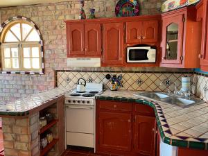 Η κουζίνα ή μικρή κουζίνα στο Casa del Puerto by Rocky Host