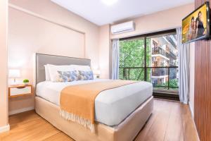 Modern Apartments in Palermo - by BueRentals客房内的一张或多张床位