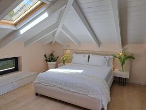 Ein Bett oder Betten in einem Zimmer der Unterkunft Rea Boutique Hotel