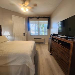 Ένα ή περισσότερα κρεβάτια σε δωμάτιο στο 1 Bed 1 Bath at IMG near Beach