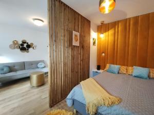 Voodi või voodid majutusasutuse Art Apartment Górnośląska 4 by Perfect Apart toas