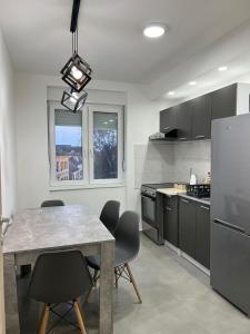 Cucina o angolo cottura di Apartman Central Lux A&D