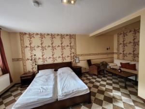Voodi või voodid majutusasutuse Hotel & Restaurant zur Post toas