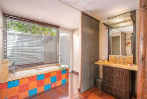 Un baño de Emeraude Villas - Beach 42 fotos más