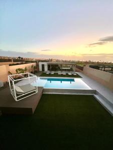 a swimming pool on the roof of a building at Villa Salitre in Costa de Antigua