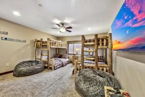 a bedroom with two bunk beds and a ceiling at Tahoe Woods 404 at Stateline - Ski Lake Casinos in South Lake Tahoe