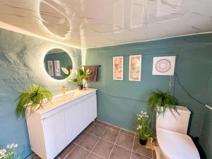 a bathroom with a sink and a toilet at Yunseul- Garden House in the City with Korean Beauty in Seoul +37 photos