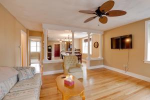 a living room with a couch and a ceiling fan at Finger Lakes Retreat 3 Mi to Seneca and Keuka Lake in Himrod