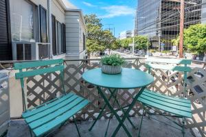 a table and two chairs on a balcony at Exquisite 1BR Suite ahead of Cedar-Sinai Hospital in Los Angeles