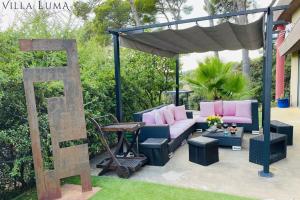 Zahrada ubytování 06AL - Architect-designed villa with pool and sea view