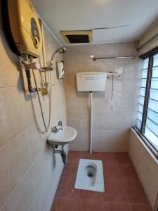 Koupelna v ubytování HOTEL BINTANG