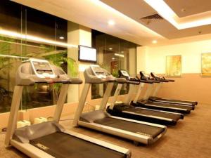 a row of treadmills in a gym at Garden Orchid Hotel & Resort Corp. in Zamboanga