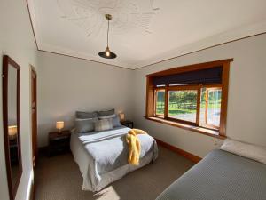 Makoura Lodge客房内的一张或多张床位