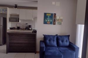 Zona de estar de Vista apaixonante: Apartamento prático e completo