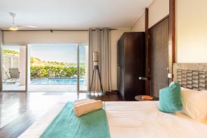 Letto o letti in una camera di Emeraude Villas - Bay