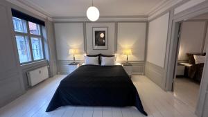 מיטה או מיטות בחדר ב-The Admirals Apartments - Apartments 1 to 3 - Carolinas apartments