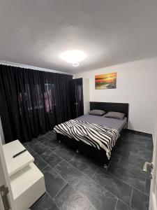 Кровать или кровати в номере Apartament Milan