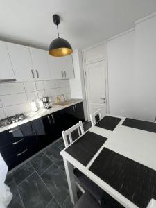 Кухня или мини-кухня в Apartament Milan
