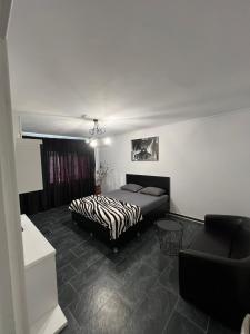 Кровать или кровати в номере Apartament Milan