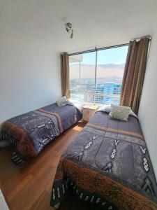 Postel nebo postele na pokoji v ubytování Nautilus, Departamento Hermosa Ubicacion Frente al Mar Piso 30