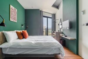 Tempat tidur dalam kamar di Chill Style Inn