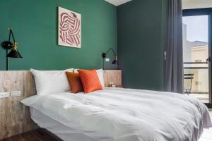 Tempat tidur dalam kamar di Chill Style Inn