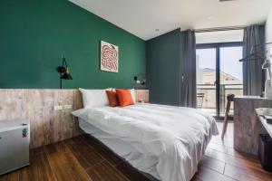 Tempat tidur dalam kamar di Chill Style Inn