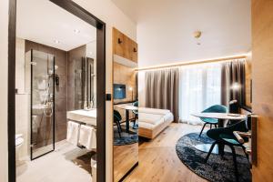 Un baño de Sonne 1806 - Hotel am Campus Dornbirn