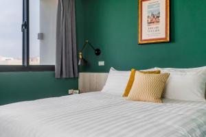 Tempat tidur dalam kamar di Chill Style Inn