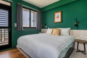 Tempat tidur dalam kamar di Chill Style Inn