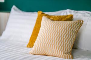 Tempat tidur dalam kamar di Chill Style Inn