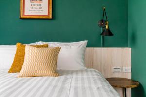 Tempat tidur dalam kamar di Chill Style Inn