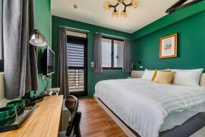 Tempat tidur dalam kamar di Chill Style Inn