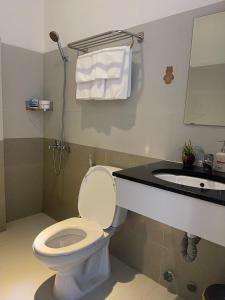 Kúpeľňa v ubytovaní KHÁCH SẠN ROMO