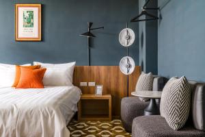 Tempat tidur dalam kamar di Chill Style Inn