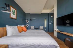 Tempat tidur dalam kamar di Chill Style Inn