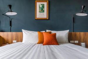 Tempat tidur dalam kamar di Chill Style Inn