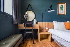 Tempat tidur dalam kamar di Chill Style Inn