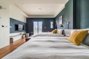 Tempat tidur dalam kamar di Chill Style Inn