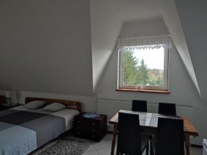 Postel nebo postele na pokoji v ubytování pokoje do wynajecia