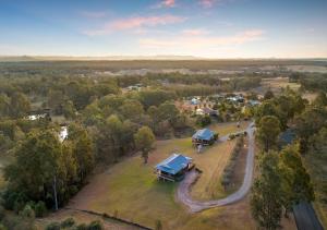 an aerial view of a farm with a house at North Lodge Highland Cottage in Pokolbin